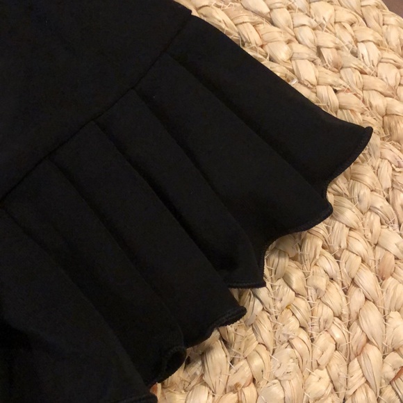 Super cute black stretch skirt by Suzi in the City, sz M, approx 24 in in length - Picture 4 of 4